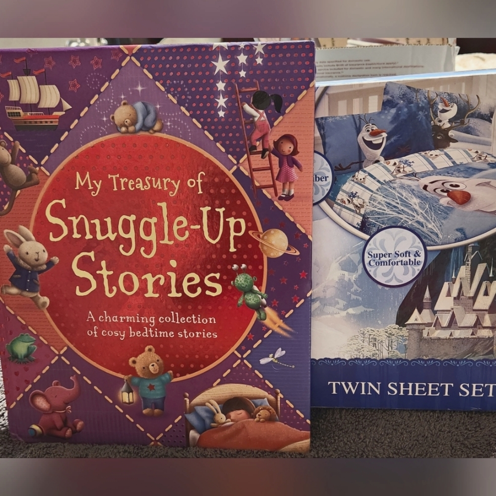 NWT Frozen Twin Sheet Set and EUC Childrens Story Book.